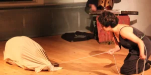 Baharak Abdolifard and Nima Nazarinia during a live theatre act in 2017